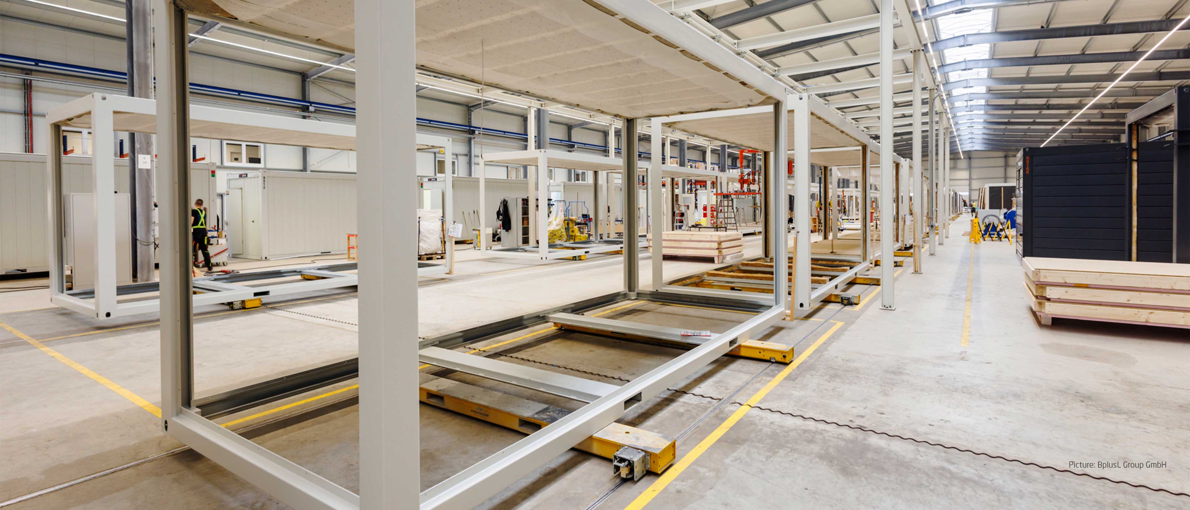 Transport- en handling-systemen voor de productie van modulebouw