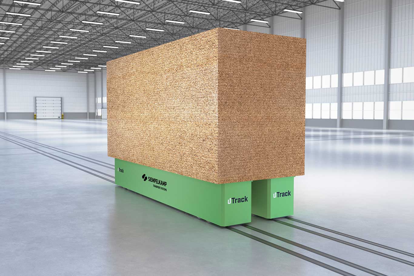 A large, rectangular object covered in a textured, beige material is positioned on a smooth floor in a spacious warehouse with bright lighting.